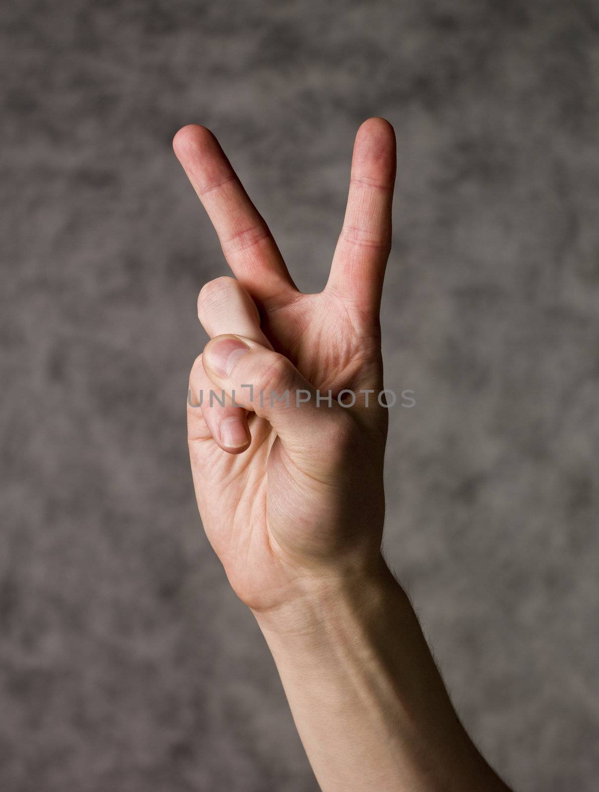 Hand making a peace sign