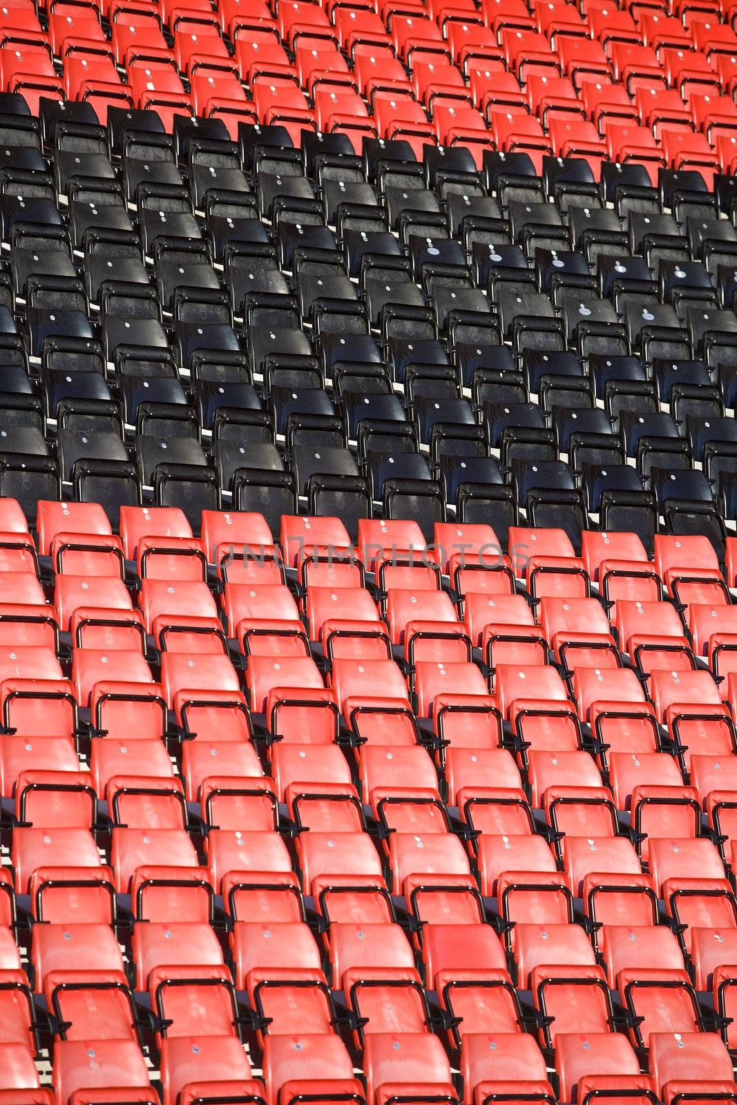 Several seats on an arena