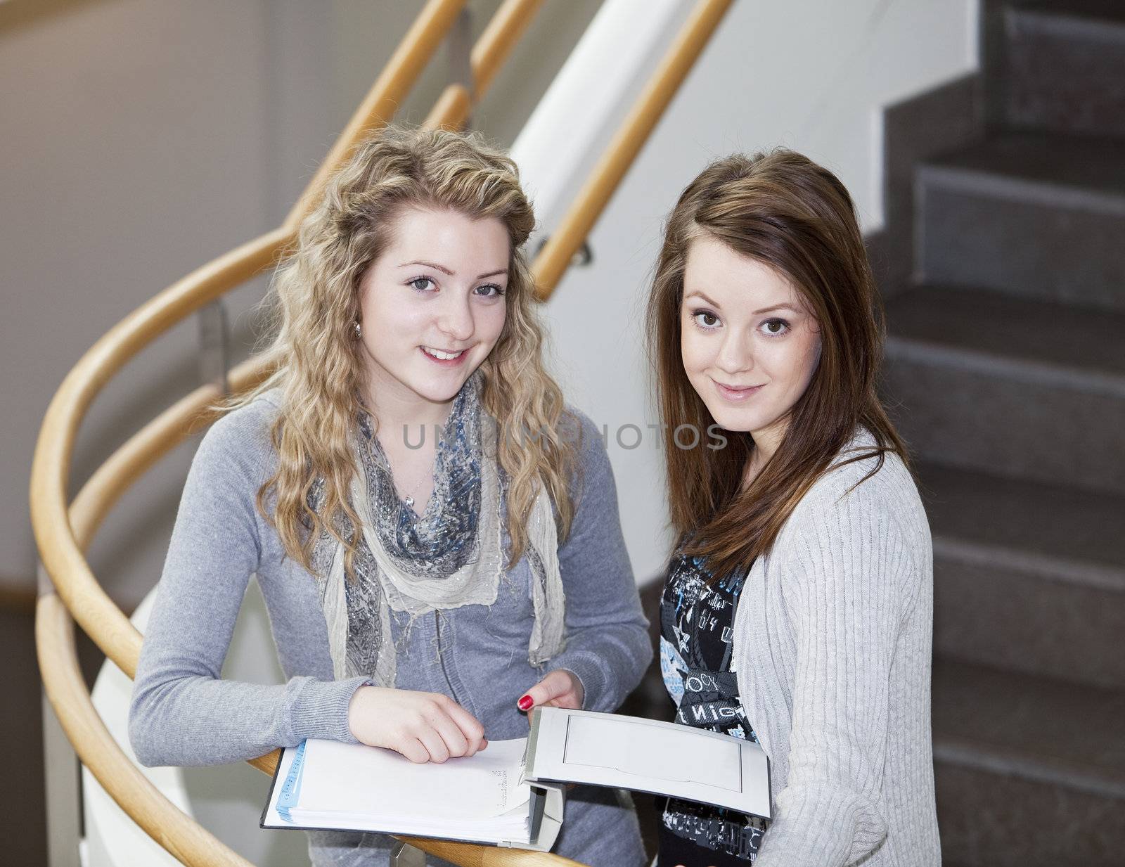 two girls studying