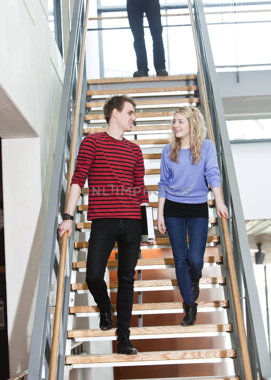 Cuple walk the stairs