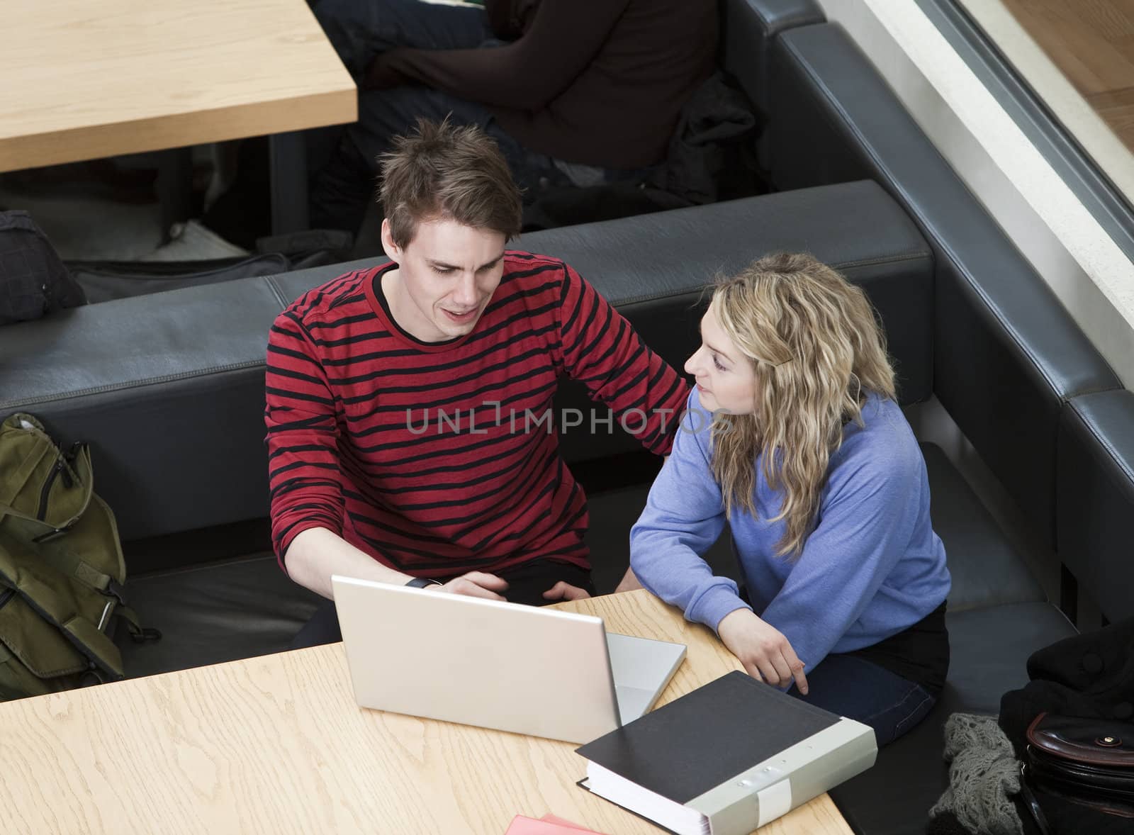 Couple in front of a laptop by gemenacom