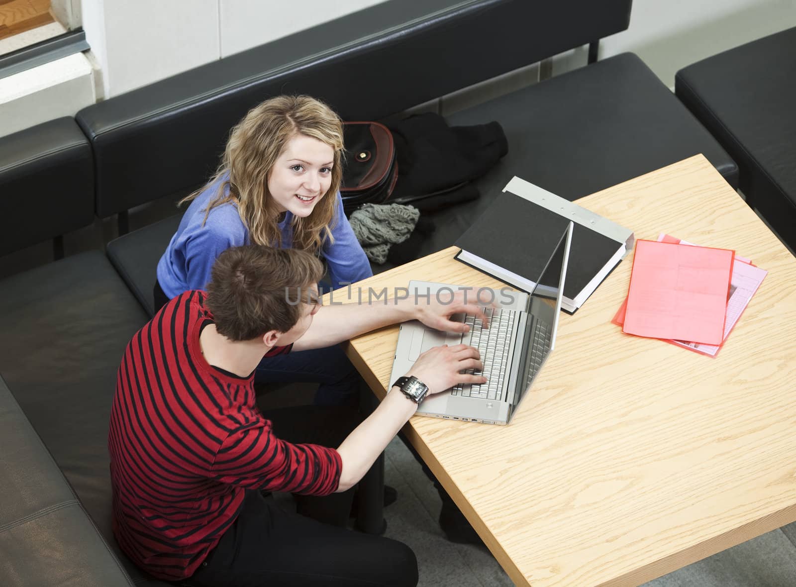 Couple in front of a computer