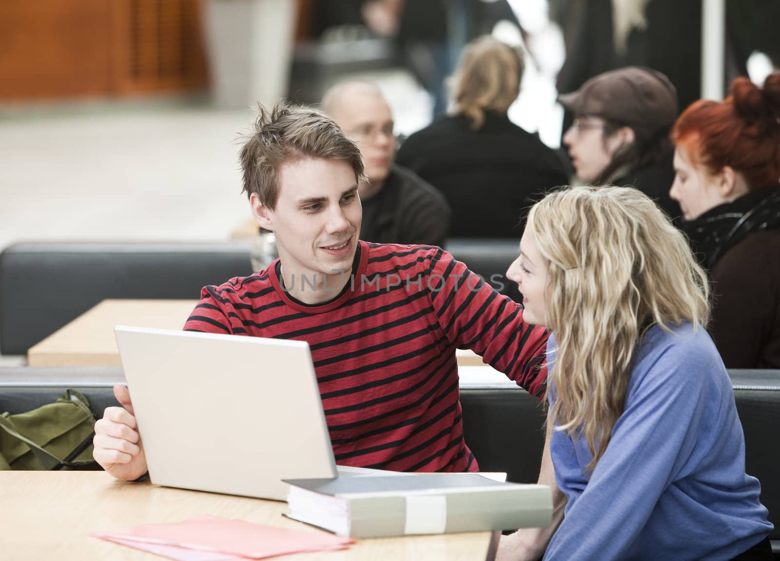 Couple in front of a computer