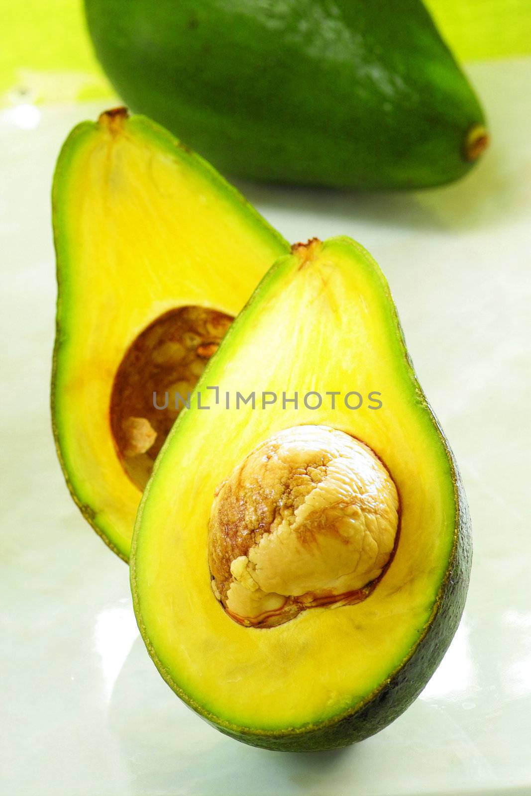 Fruit Photography another Fresh Avocado shot on table
