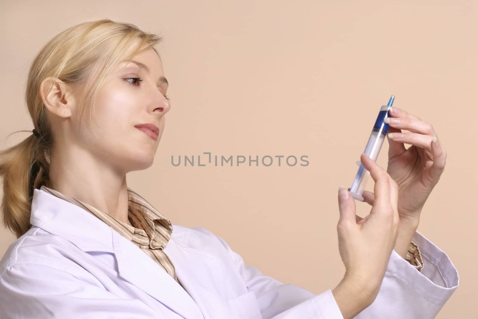 Healthcare worker with a syringe
