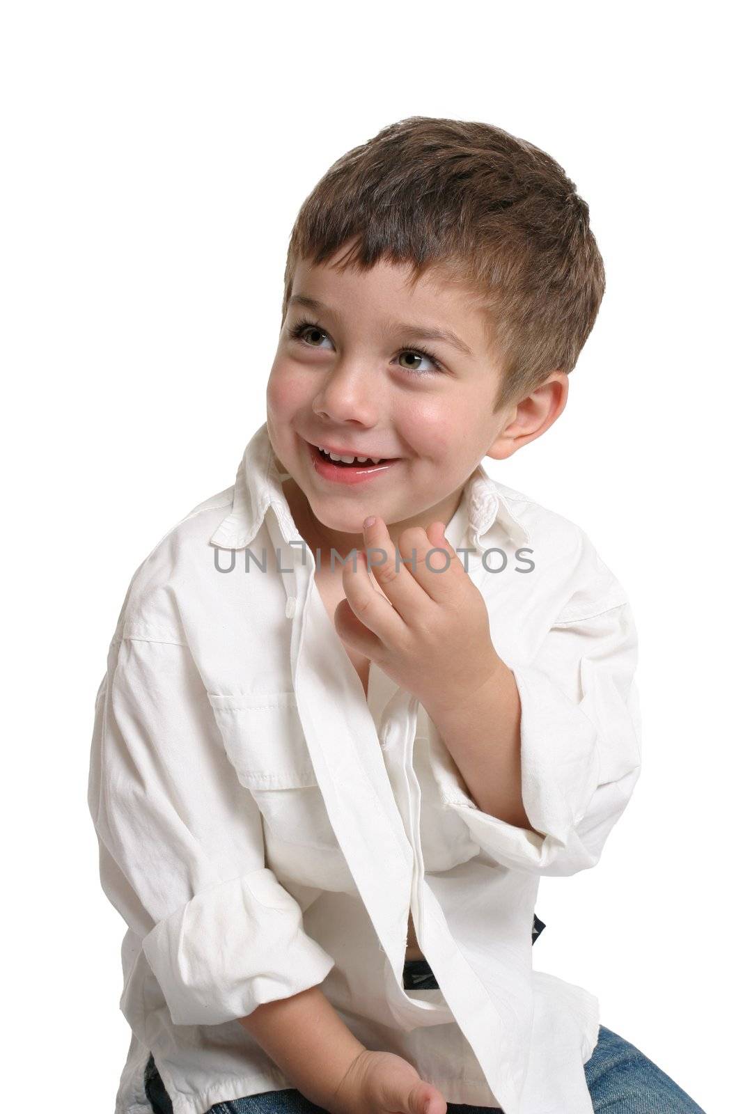 Beautiful young boy with a gorgeous smile - white background with space.