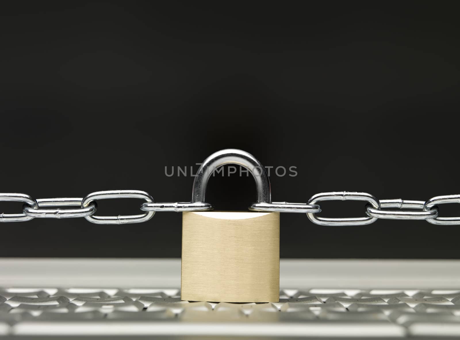 Chain and a lock on a keyboard