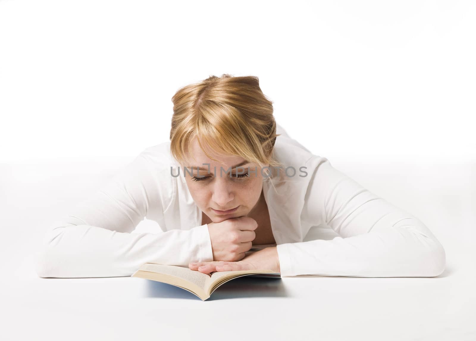 Woman reading a book by gemenacom