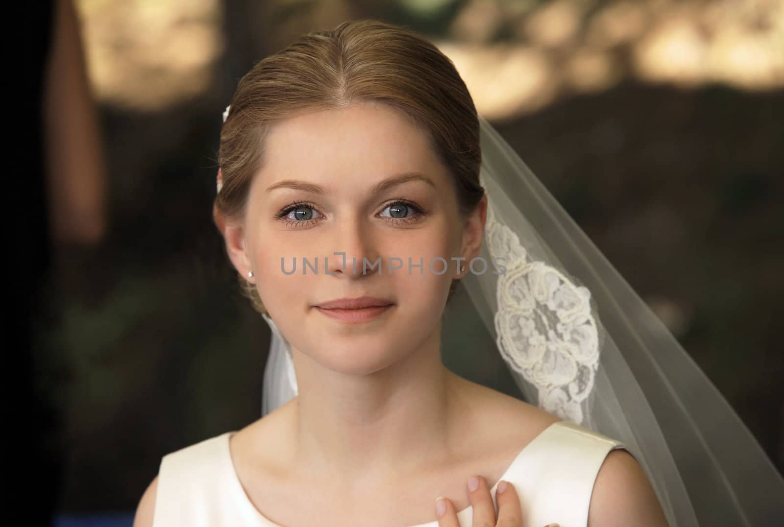 The beautiful bride on a dark background