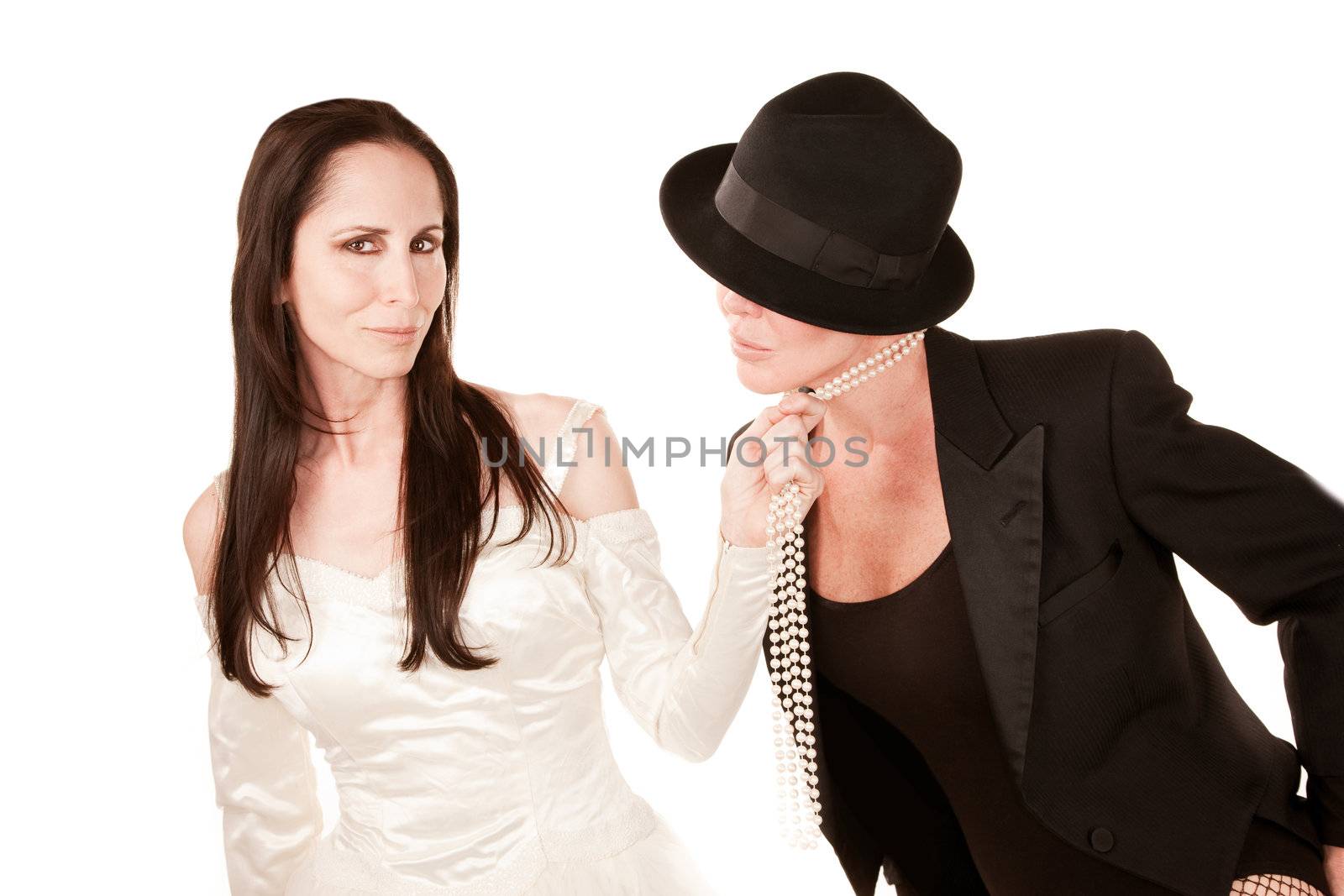 Two women dressed as traditional brinde and groom