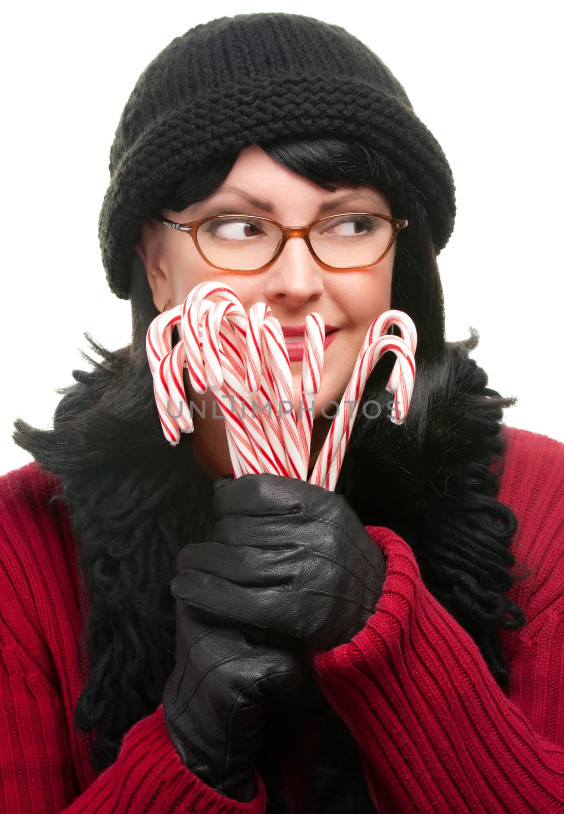 Pretty Woman Holding Candy Canes Isolated on a White Background.