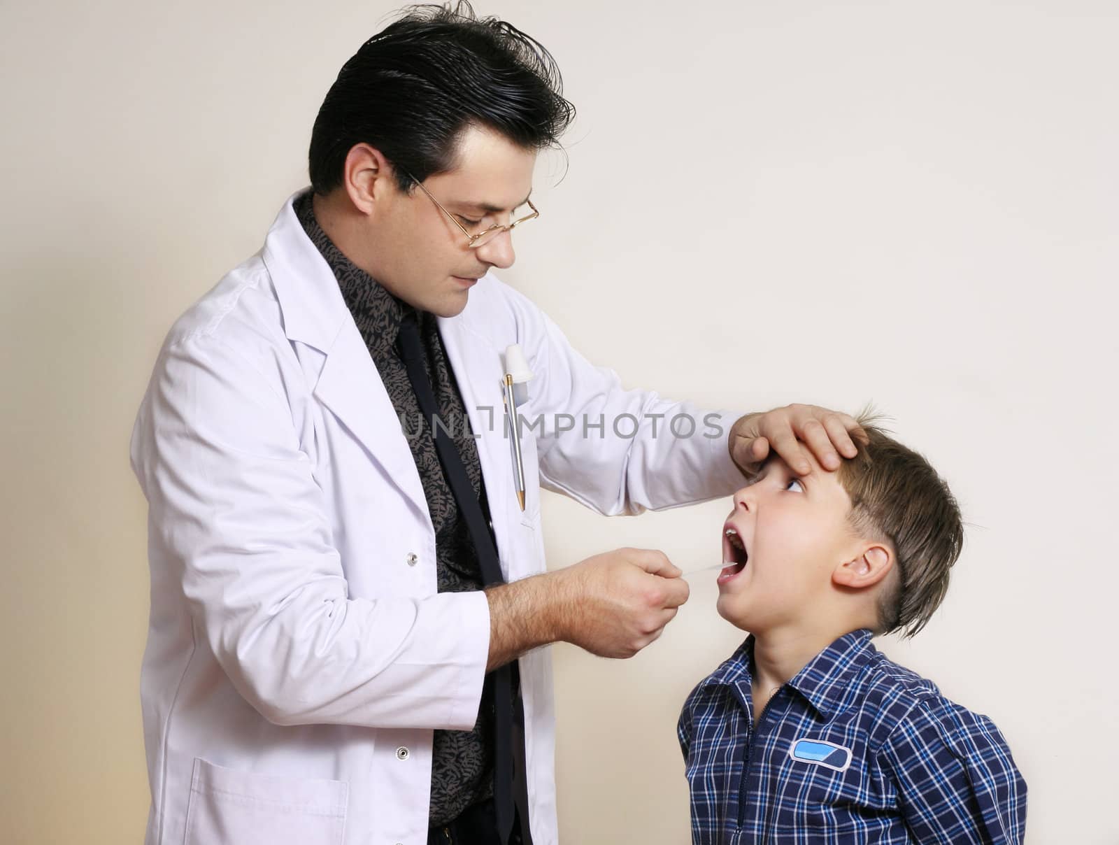 Doctor assessing a young patient