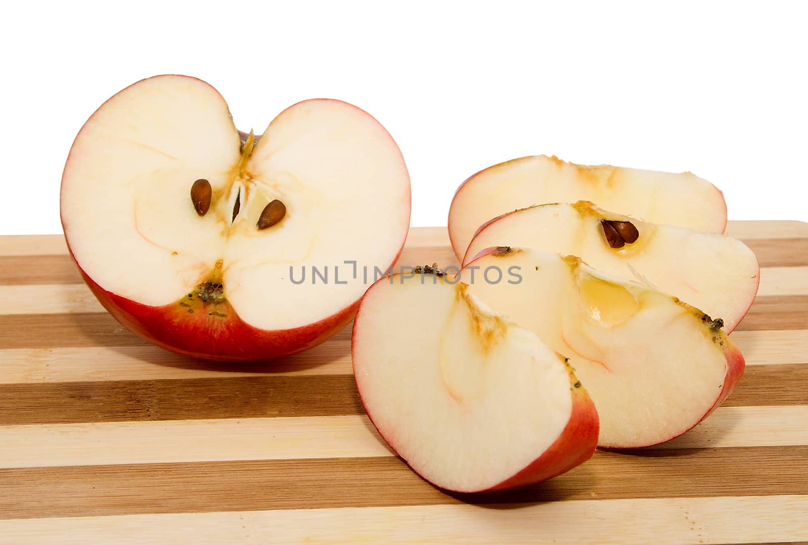 Red apple on chopping board