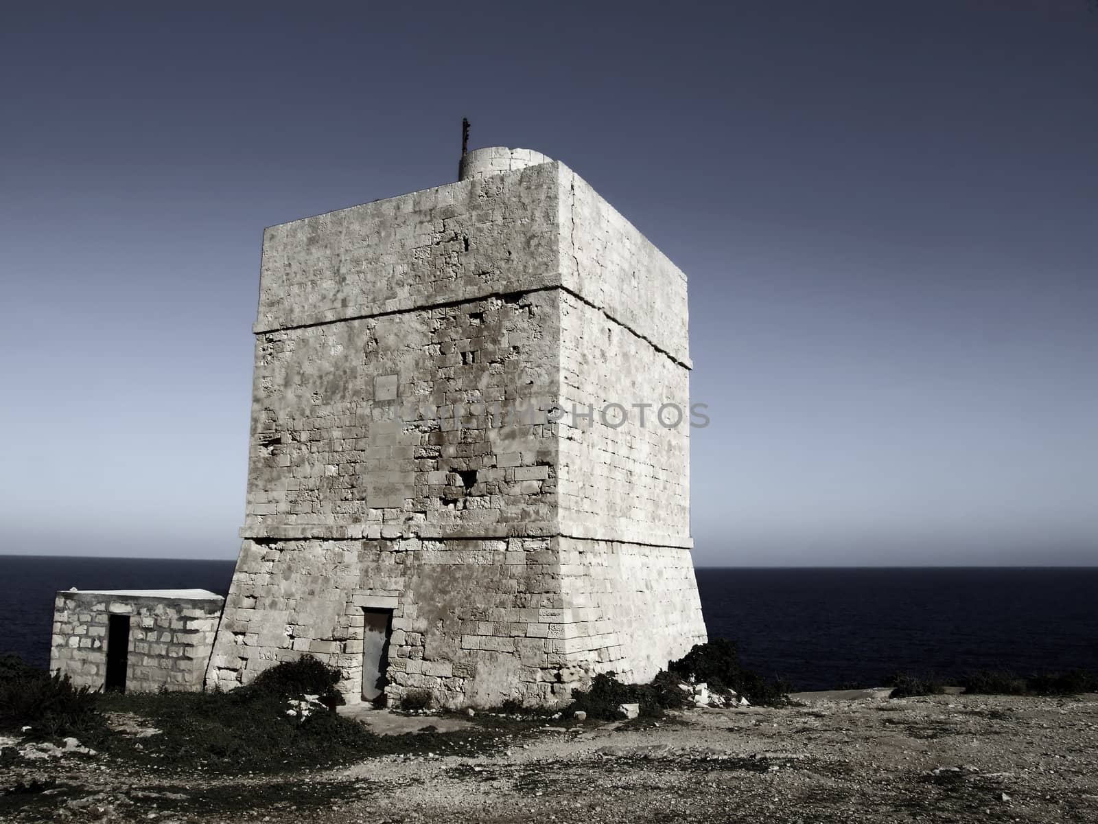 Medieval defense tower situated in a strategic defensive location, in Malta