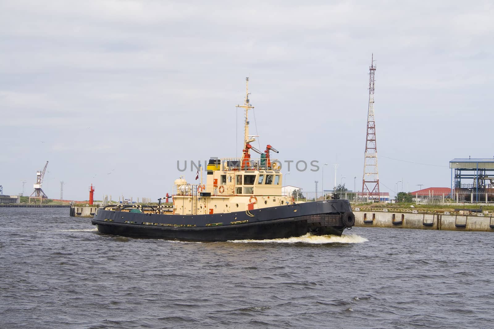 One of tugboats near the ferry terminal in the harbor in Ventspils, Latvia.