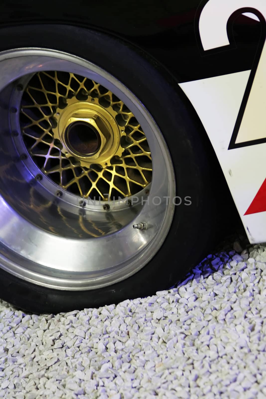 the golden wheel of a racing car