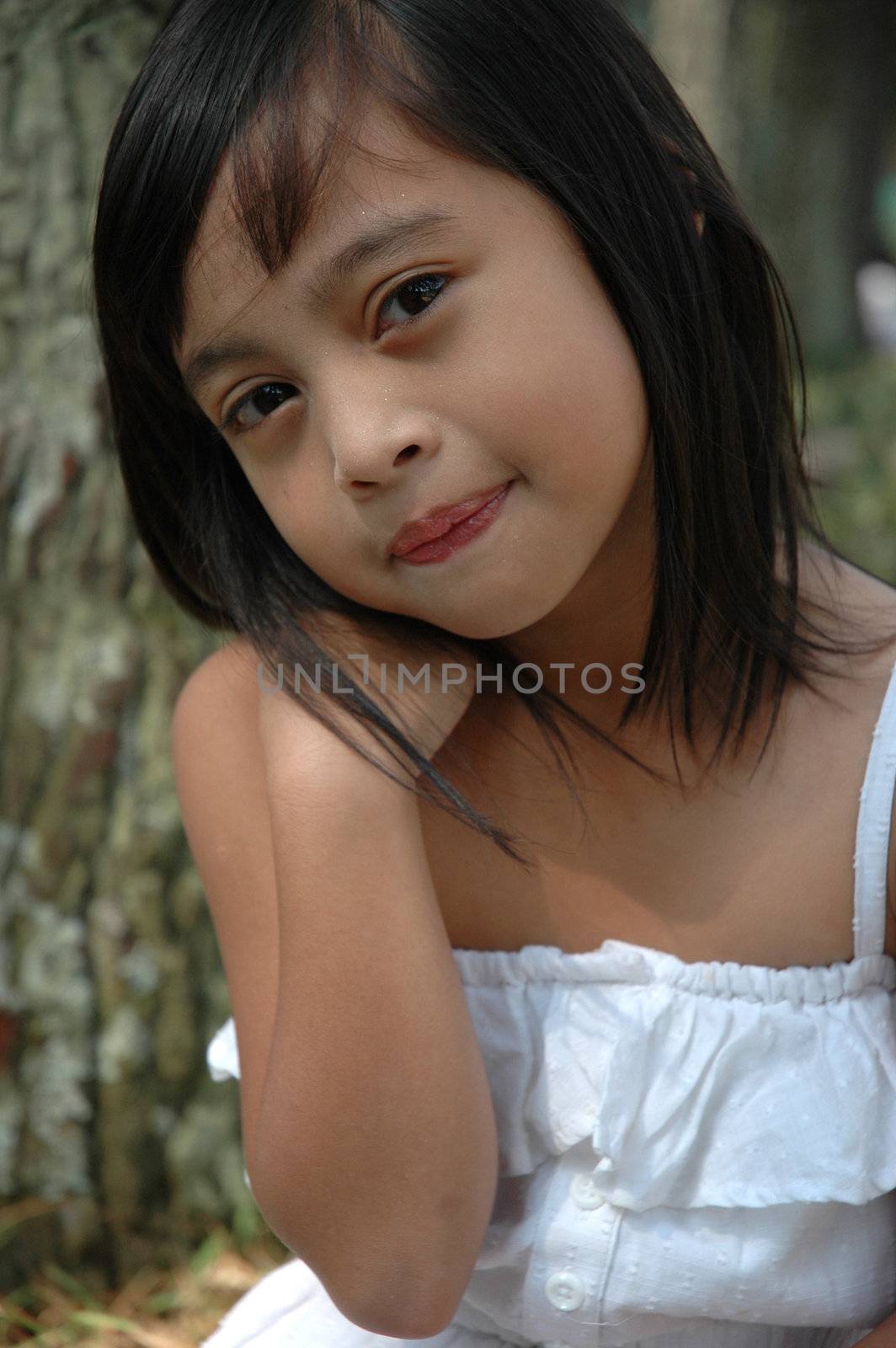 little asian girl with nice smile expression