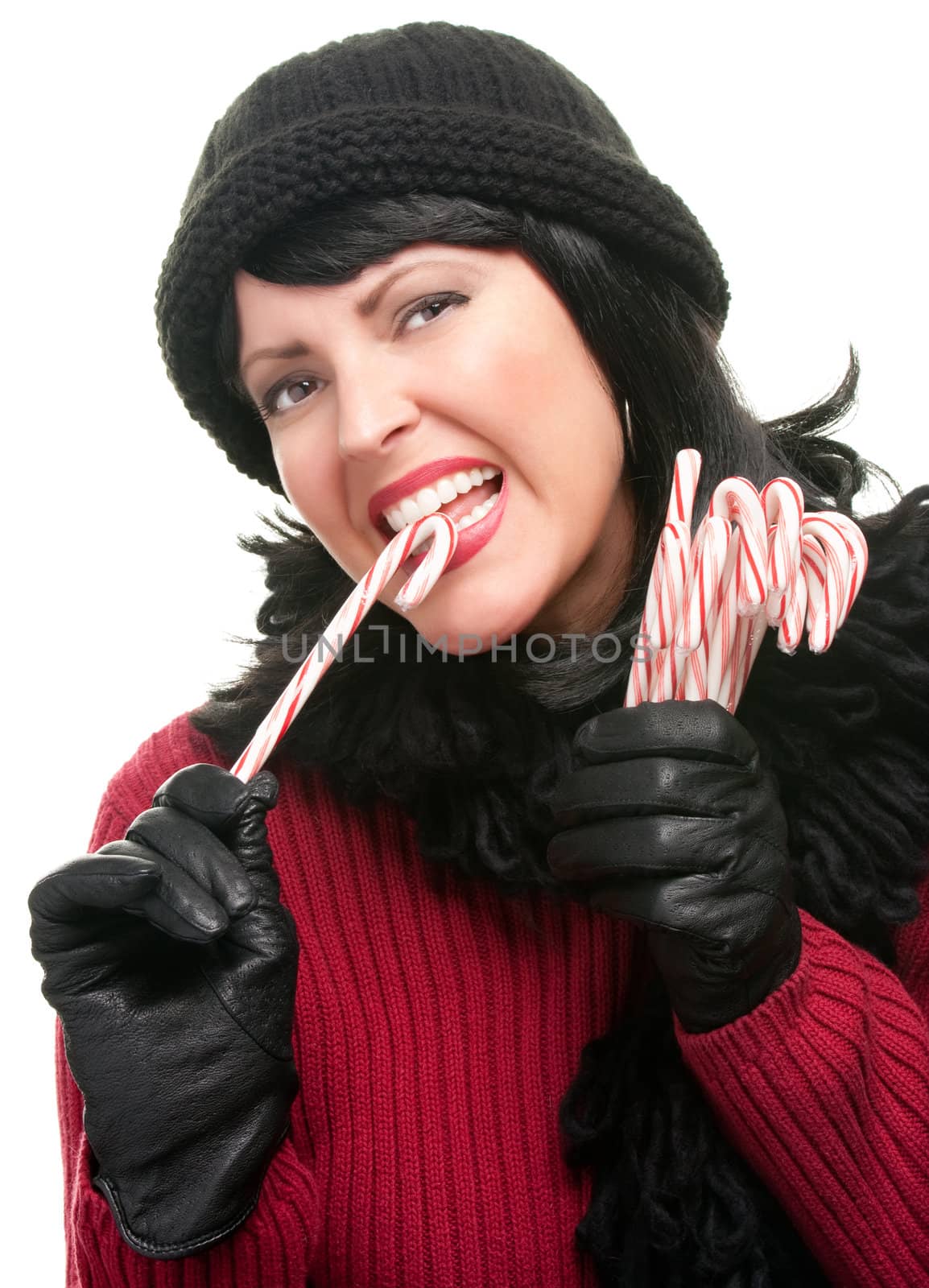 Pretty Woman Holding Candy Canes Isolated on a White Background.