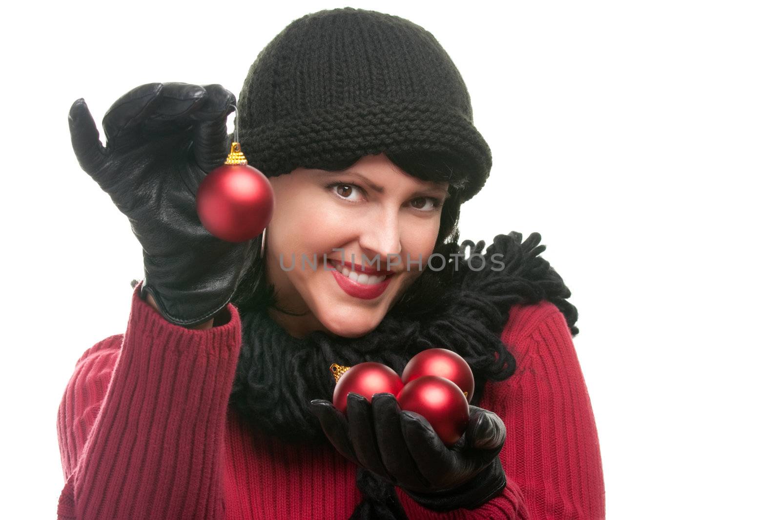 Attractive Woman Holding Christmas Ornaments Isolated on a White Background. 