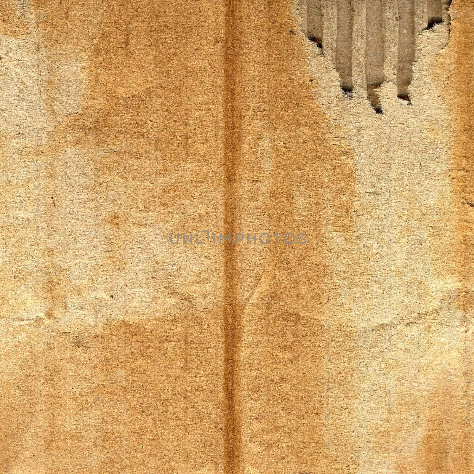 Old grunge corrugated cardboard useful as a background