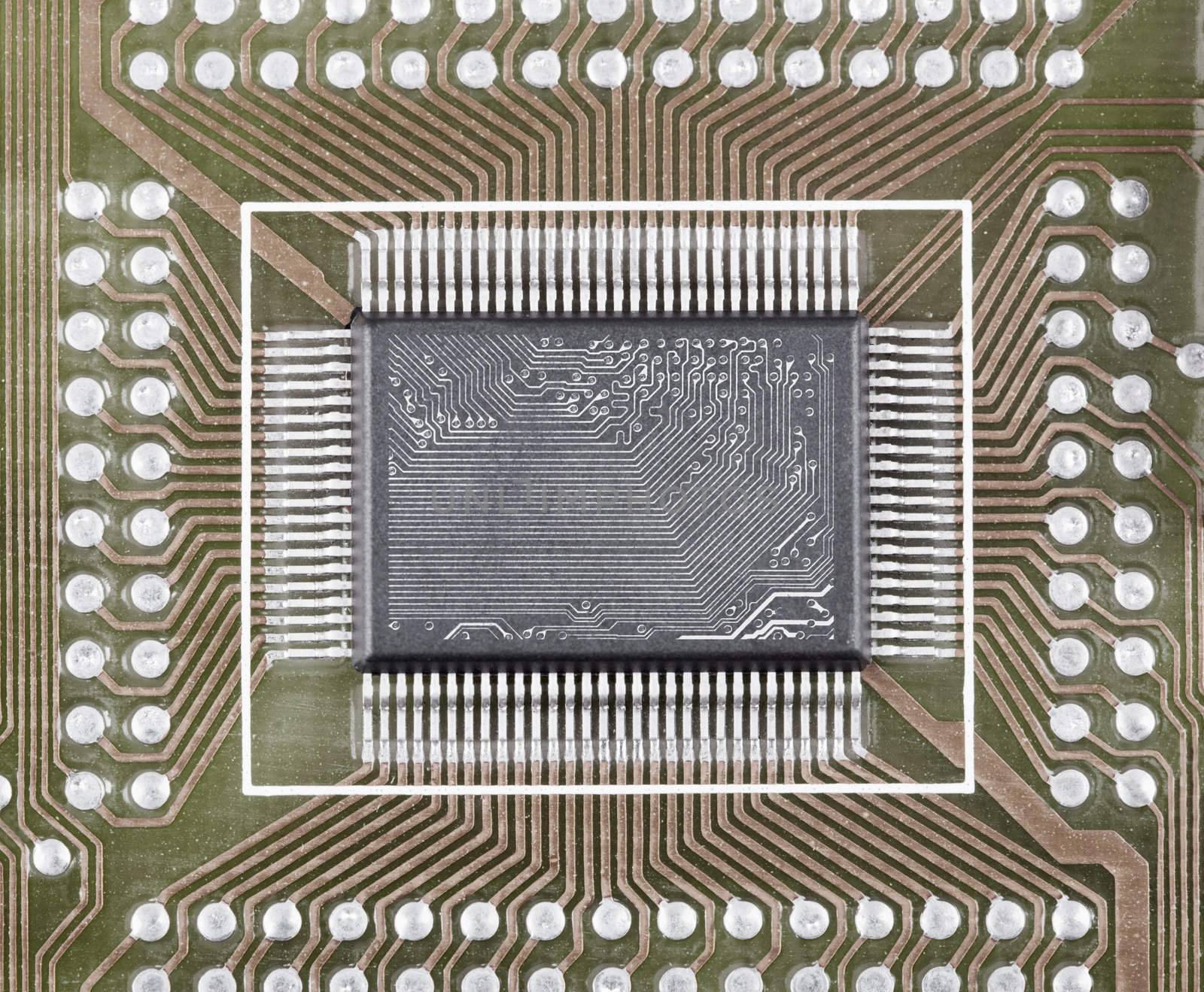 Old integrated microcircuit on a circuit board surface