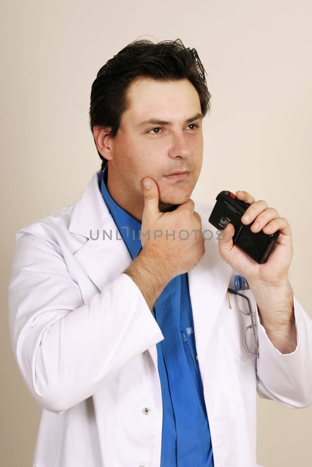 Doctor recording patient information