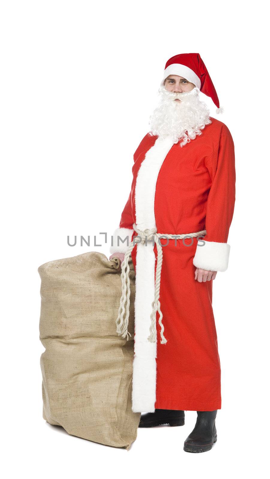 Santa claus with a sack og gifts isolated on a white background