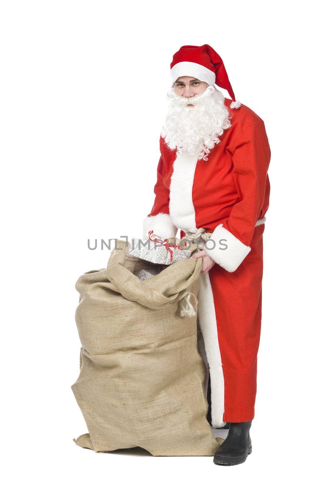 Santa claus with a sack og gifts isolated on a white background