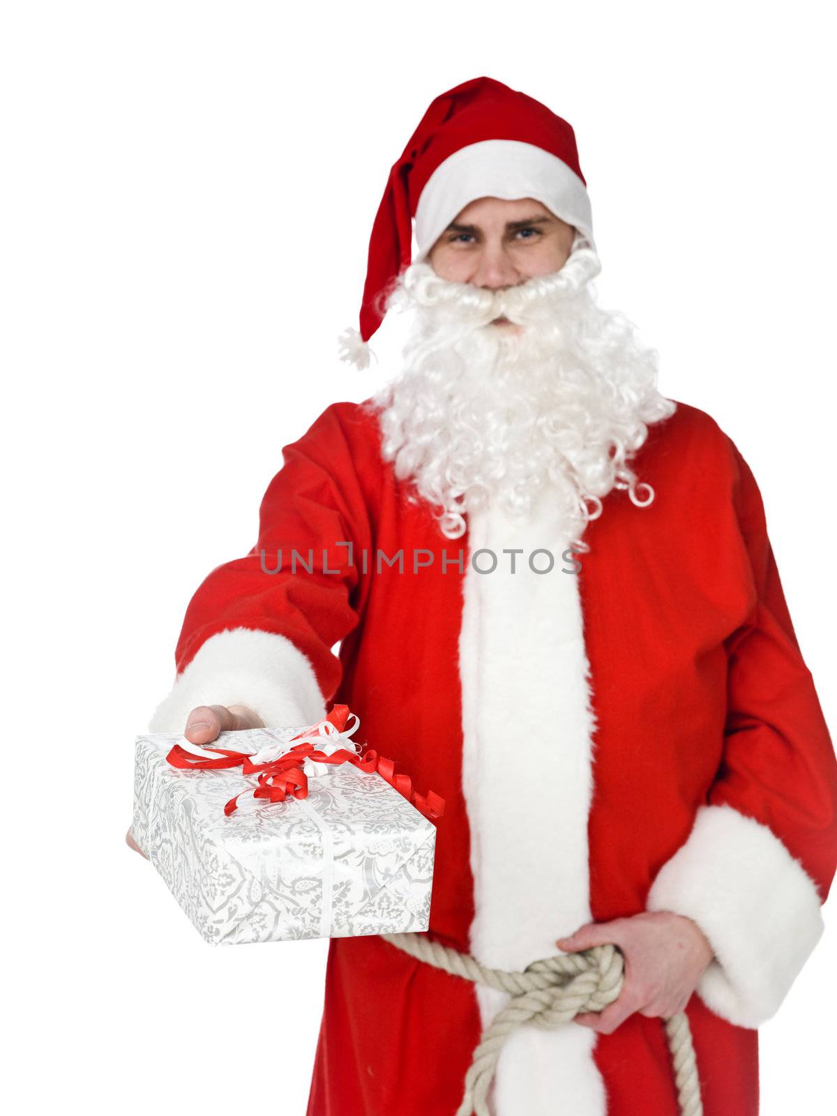 Santa claus is offering a gift isolated on white