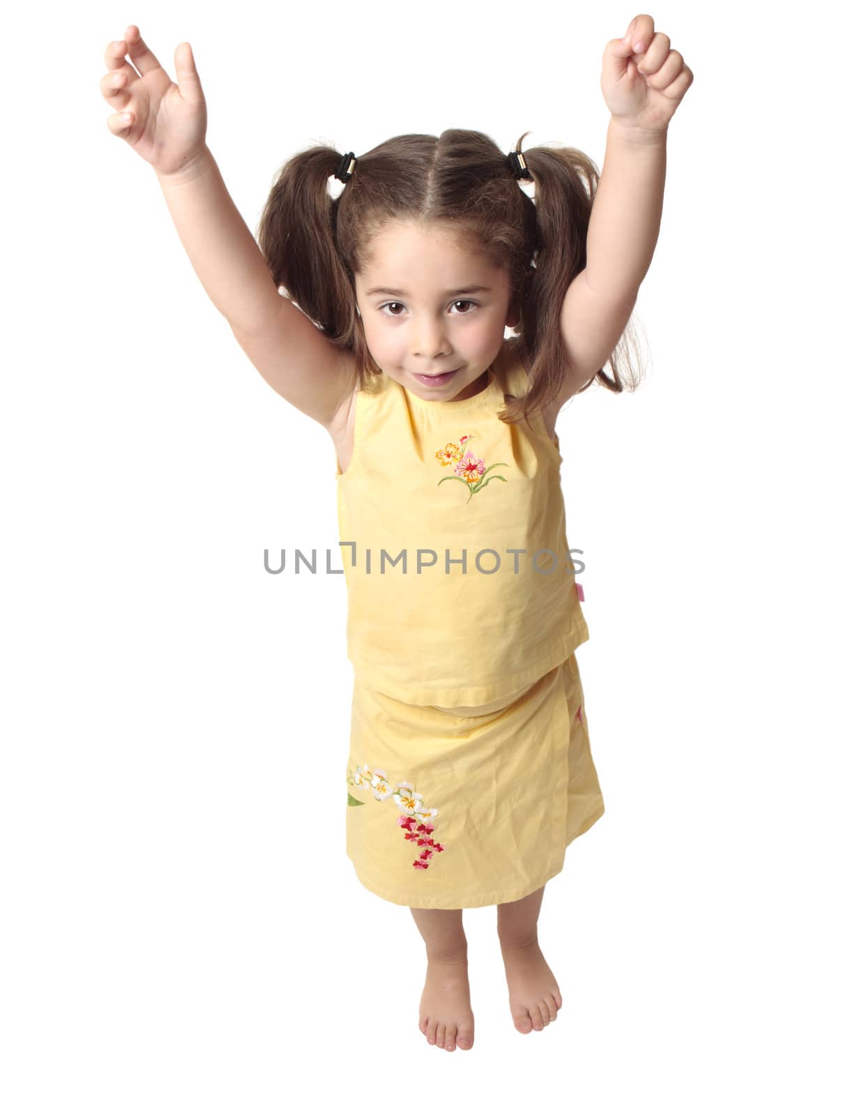 Preschool girl with arms raised above head by lovleah