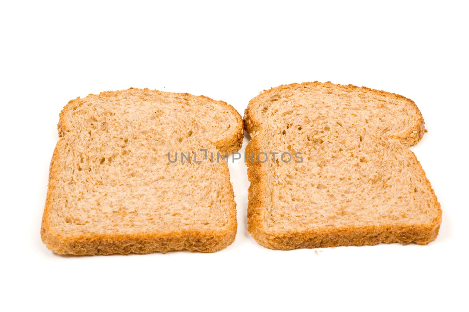 two perfect slices of bread isolated on a white background by ladyminnie