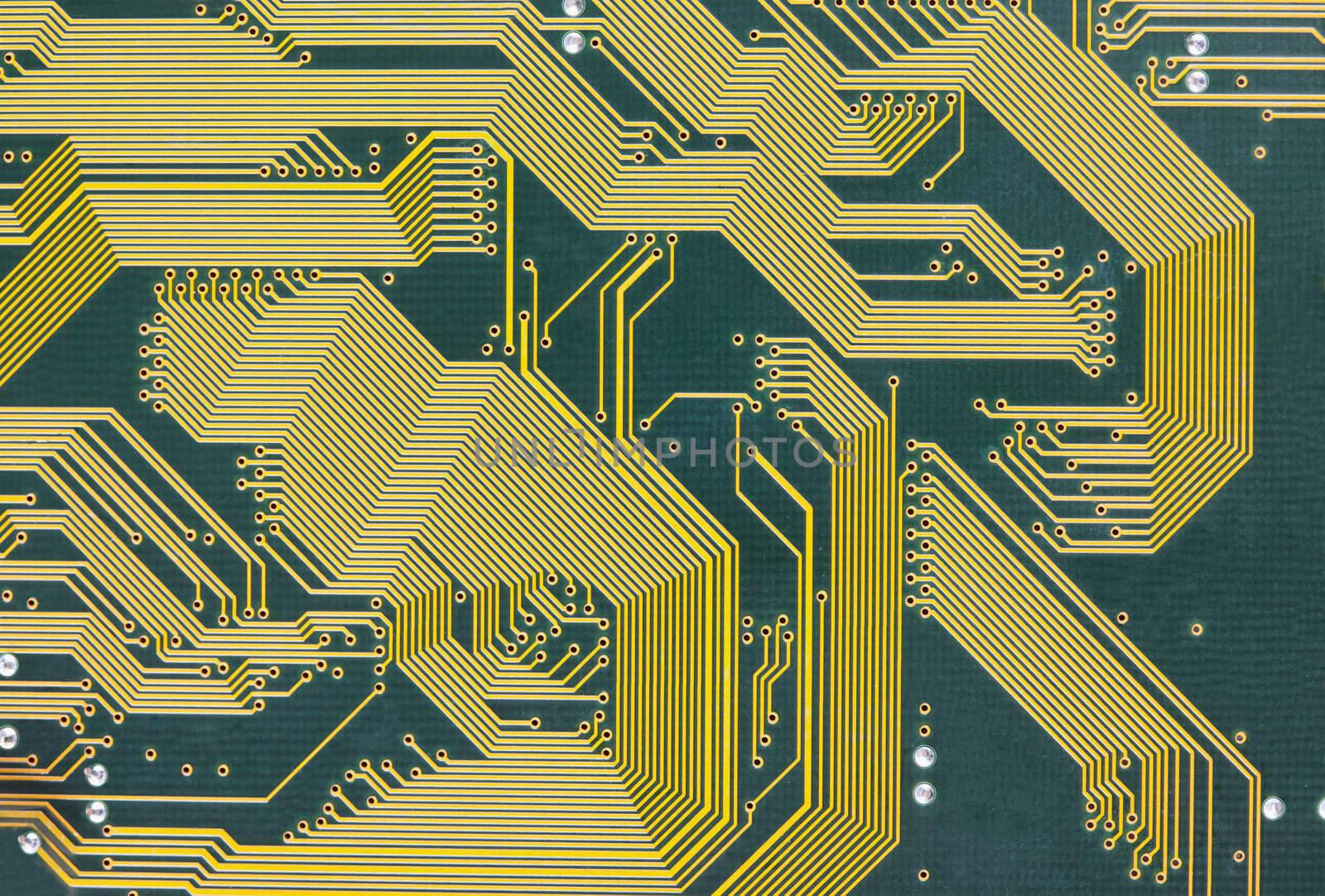 The electronic circuit board hi-tech green background
