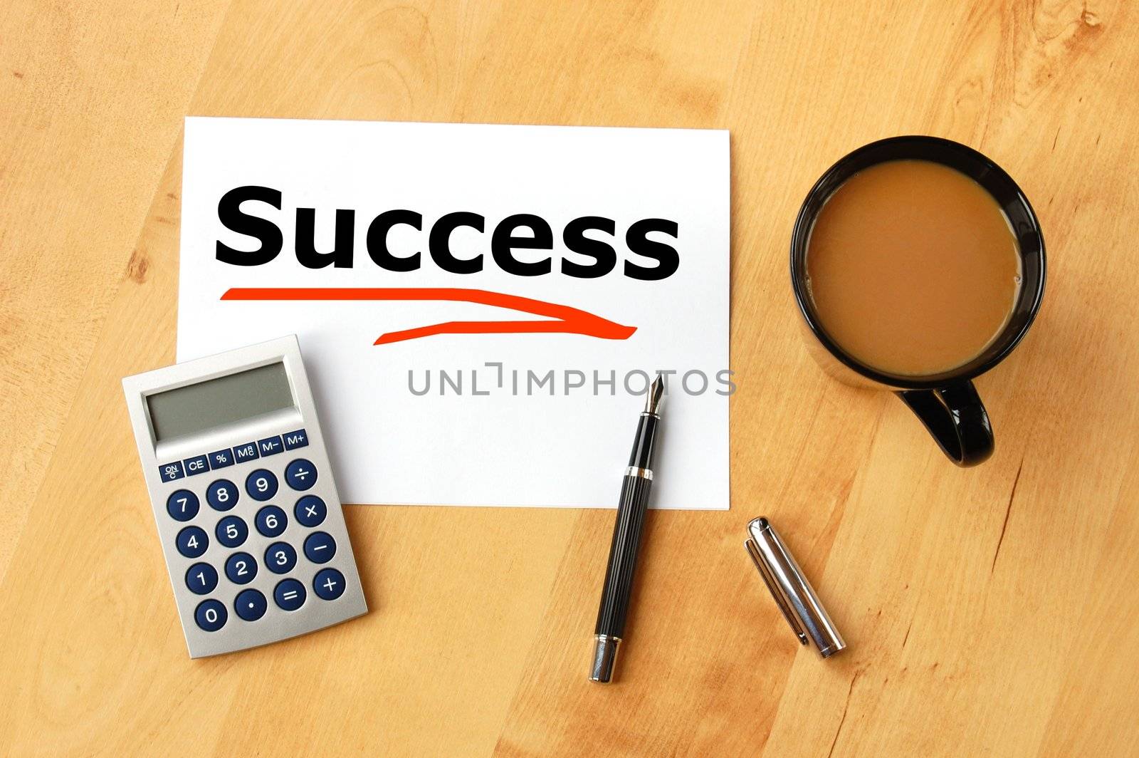 business success concept with pen paper and coffee in office