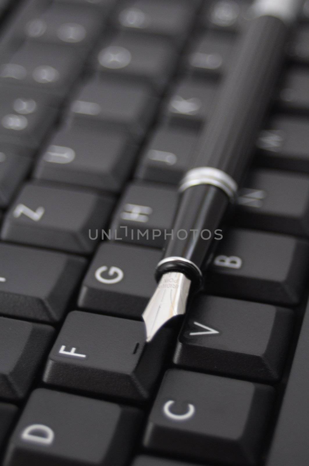 pan and black computer keyboard showing communication concept