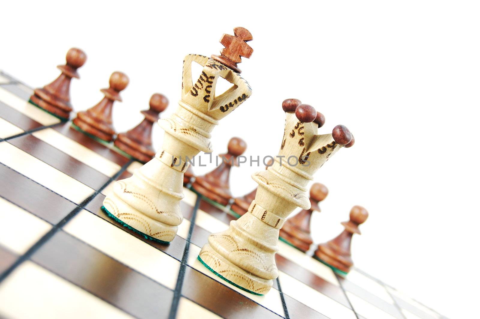 chess pieces on chess board showing concept for success and power