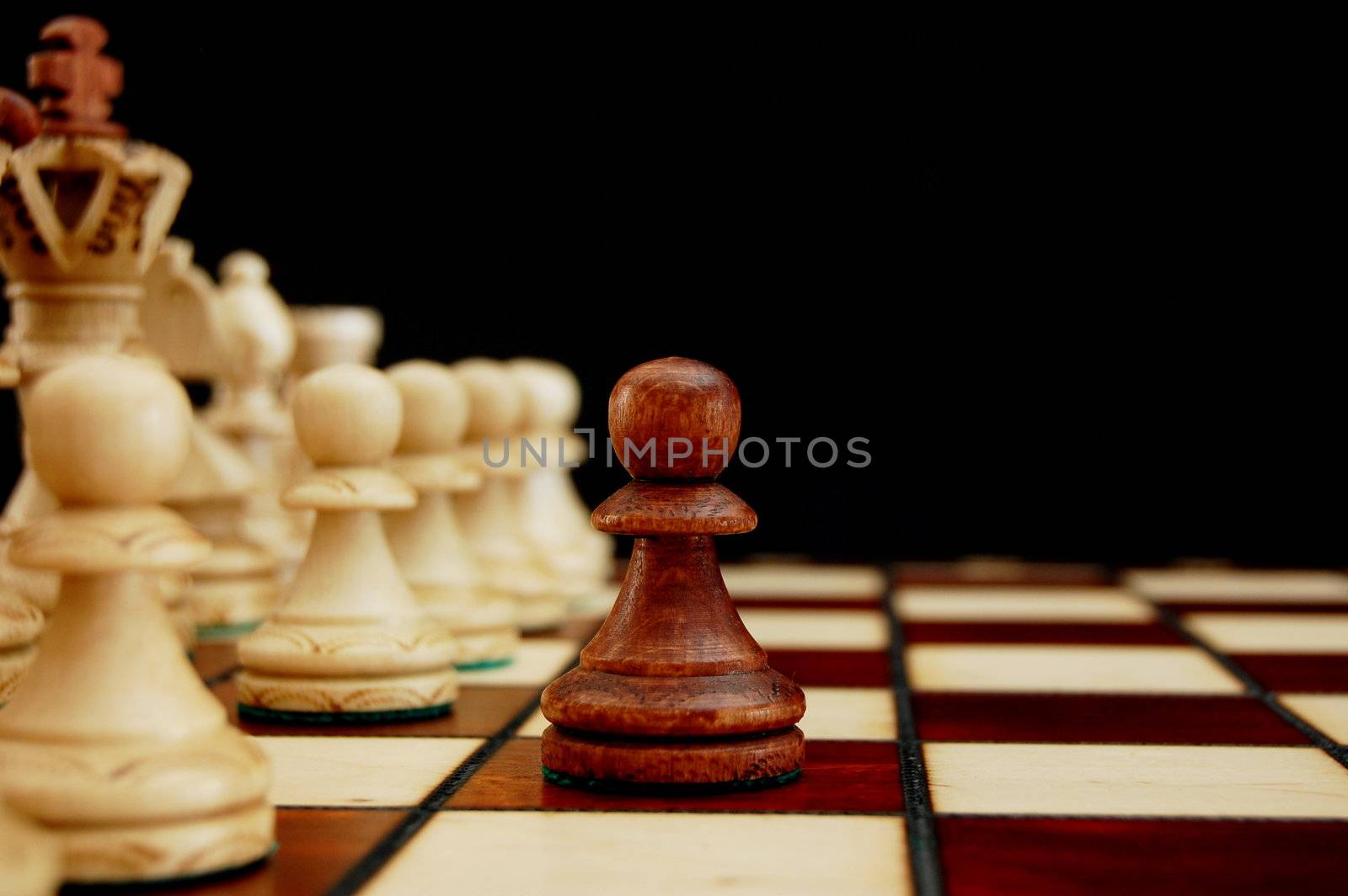 chess pieces showing concept of conflict power and success