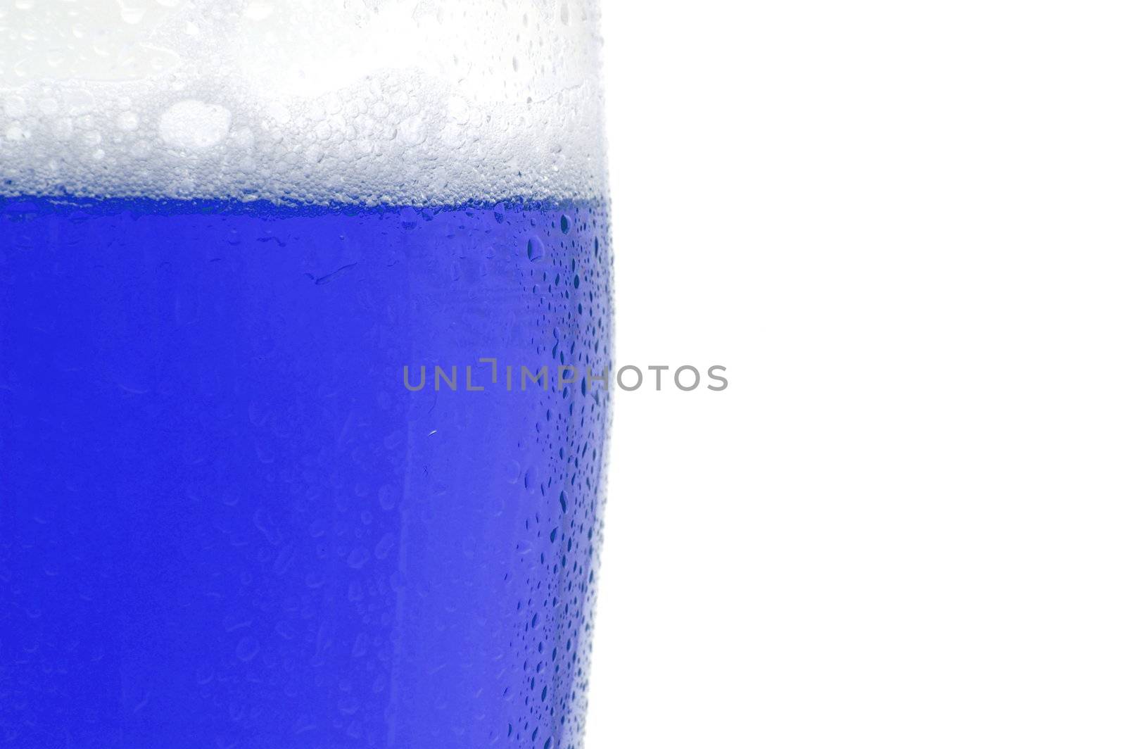 colored drink with foam isolated on white background