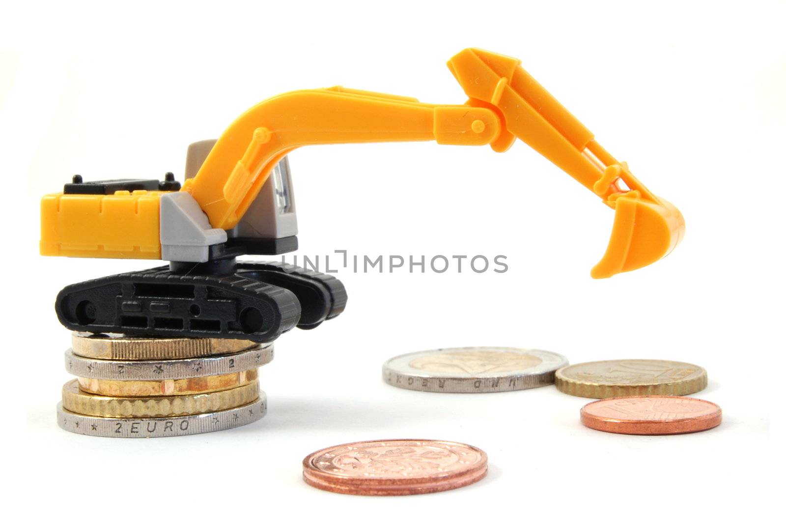 making euro money coins with digger isolated on white background