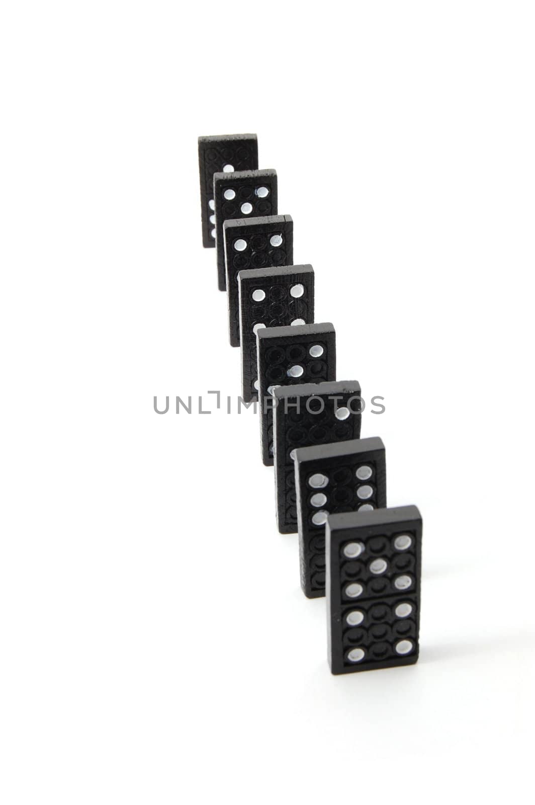 chain of dominoes isolated on a white background