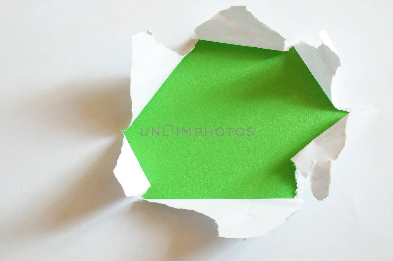 green hole in blank sheet paper by gunnar3000
