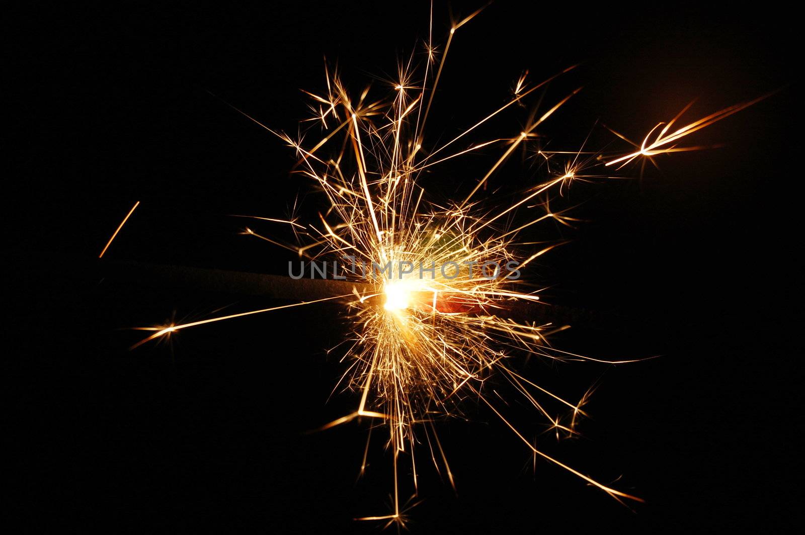 holiday sparkler isolated on black background with copyspace