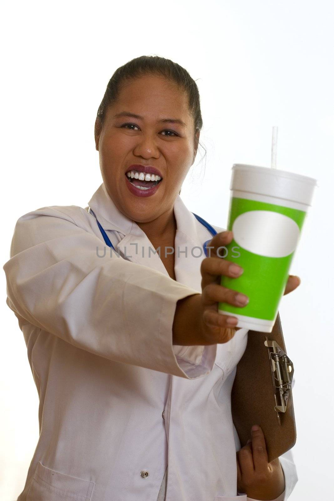 Healthy life, healthy choices.   Ethnic doctor, nurse or dietician, holding a fresh juice