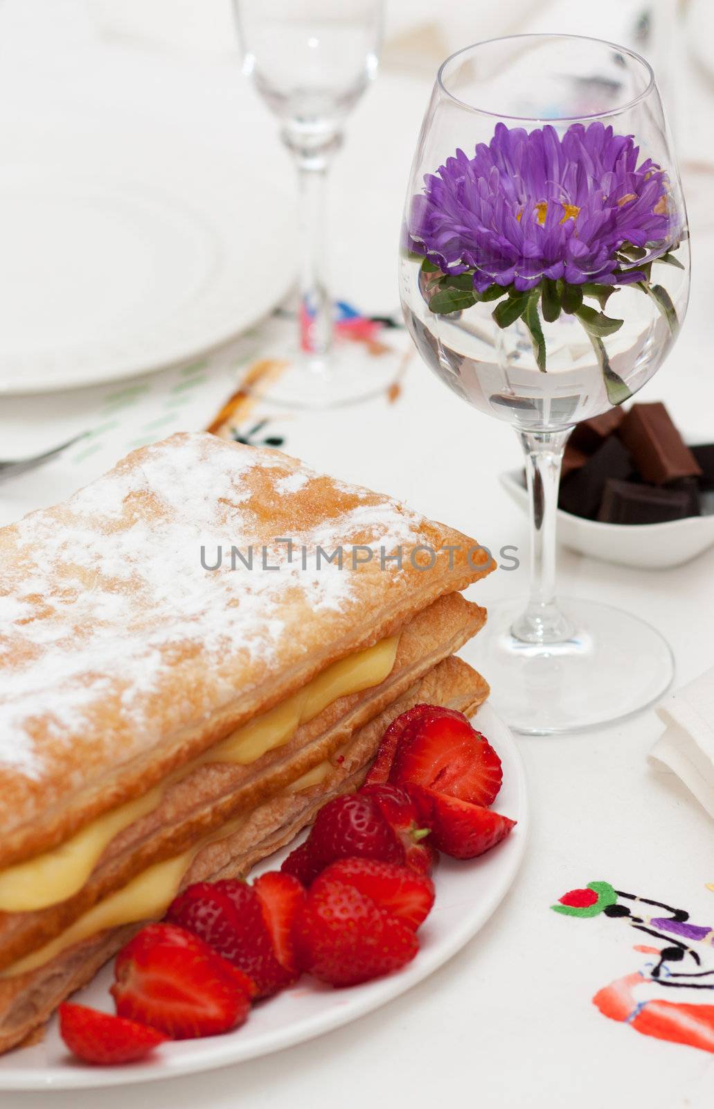 Homemade cake, pastry cream and strawberries