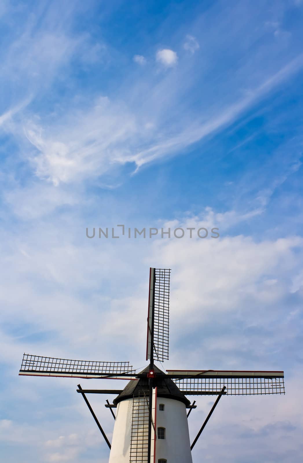 Windmill against nice blue sky, with copyspace