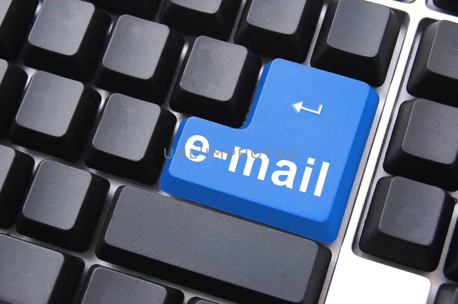 email button on computer keyboard showing concept for internet communication