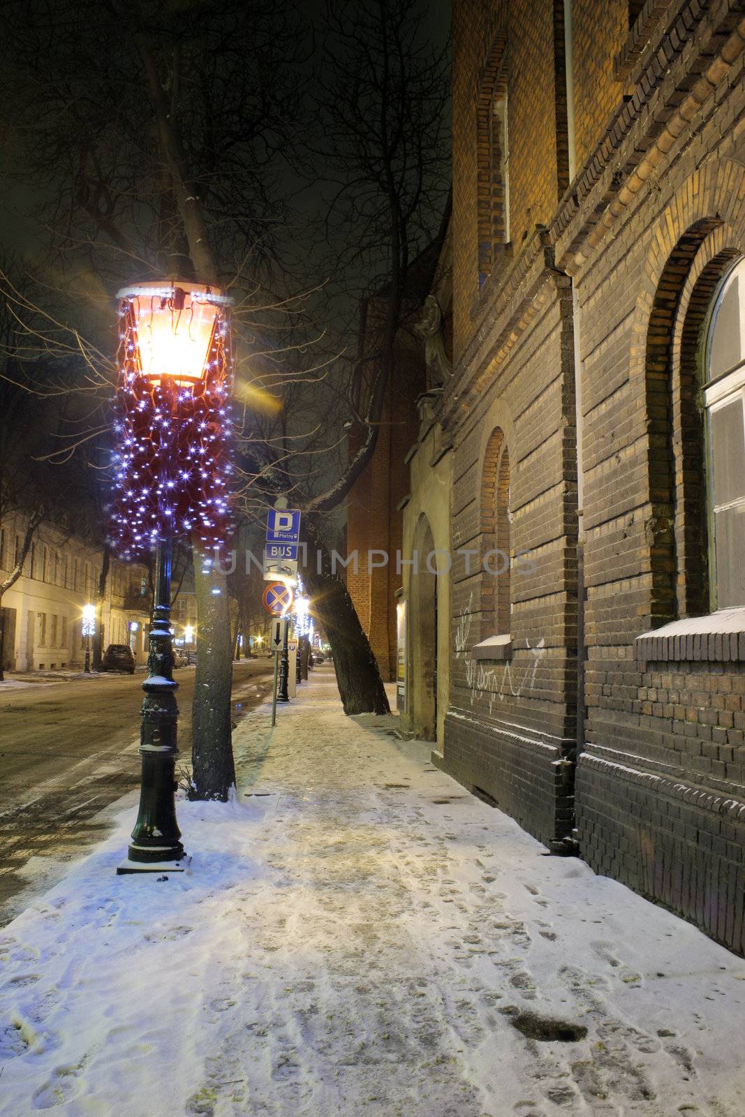 Old town street during the night in Poznan, Poland
