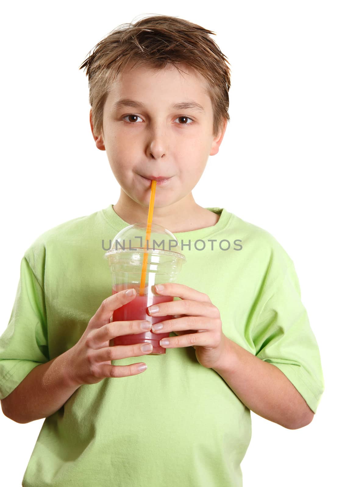 A child drinking a fresh berry juice packed full of vitamins and healthy nutrition.