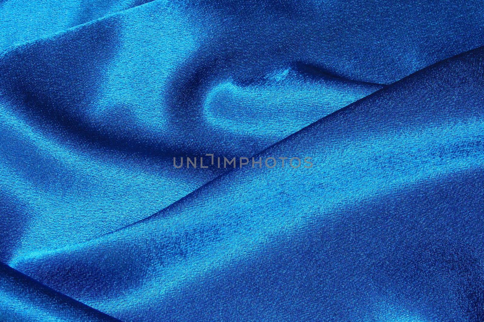 blue satin or silk background with textile texture