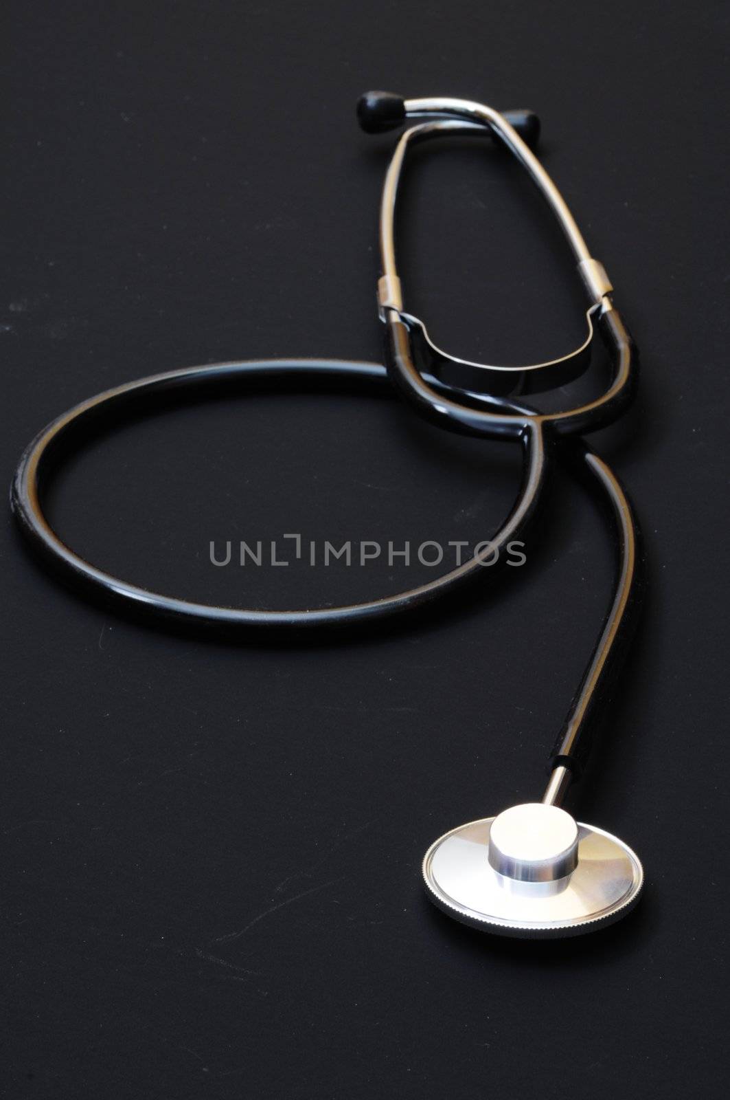 stethoscope on black by gunnar3000