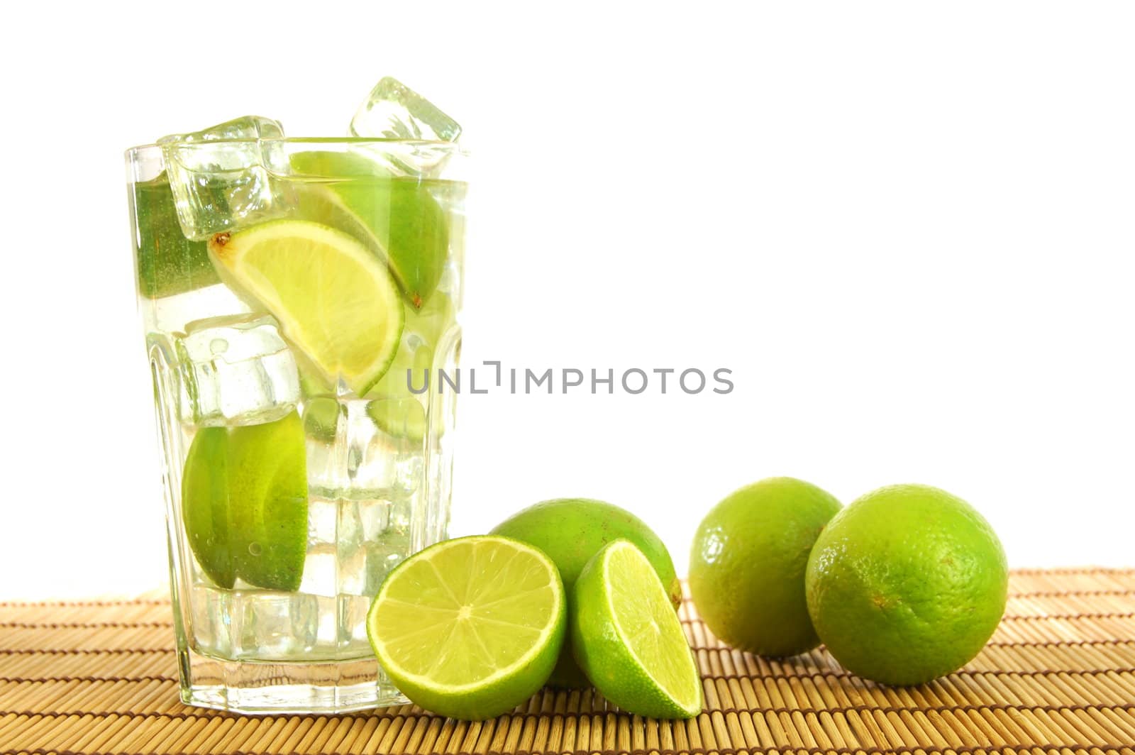 fresh Caipirinha with lemon on white background